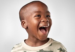 Boy smiles after visiting his Bartlesville children’s dentist 