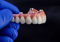 Implant dentures may be more expensive up front but are a better investment overall