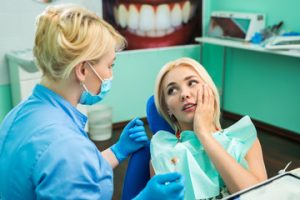 Patient in need speaking with dentist 